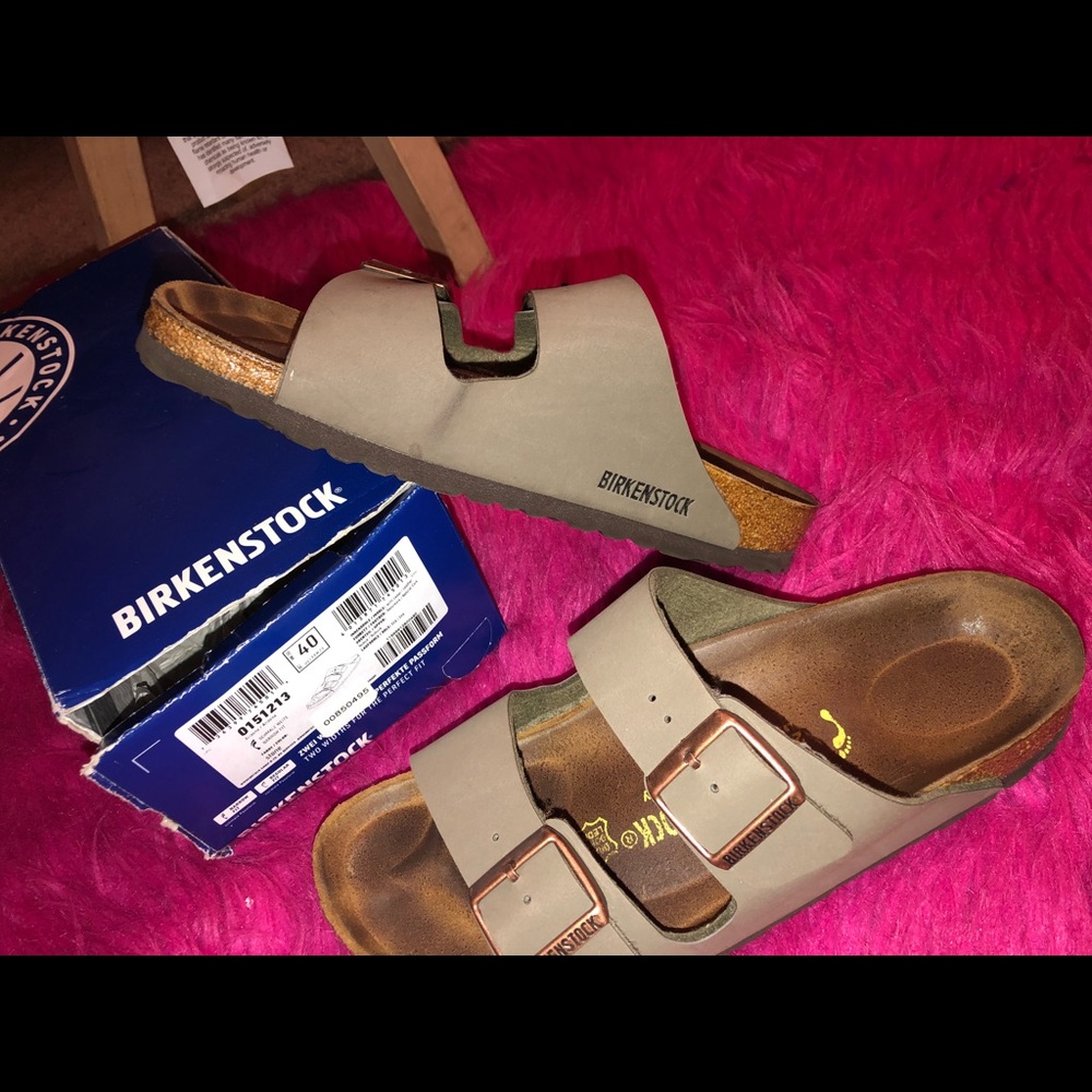 Olive green Birkenstock sandals.